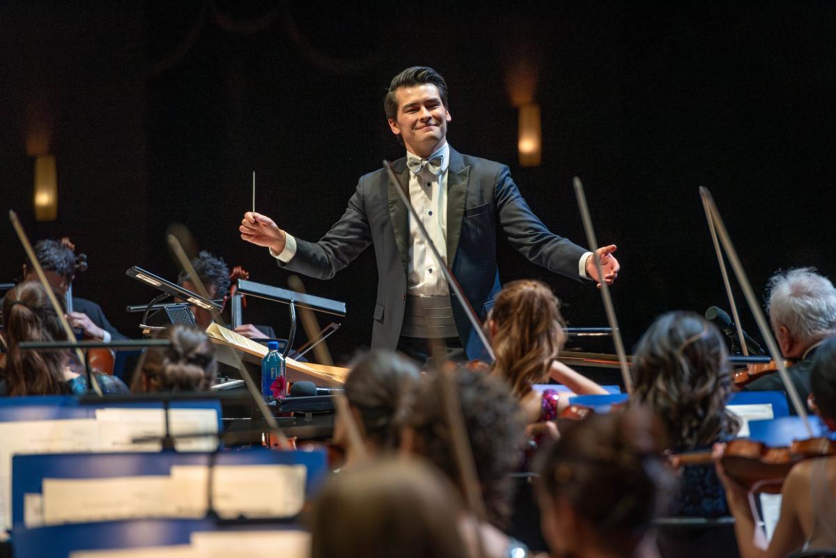 Norman Hyunh conducting.