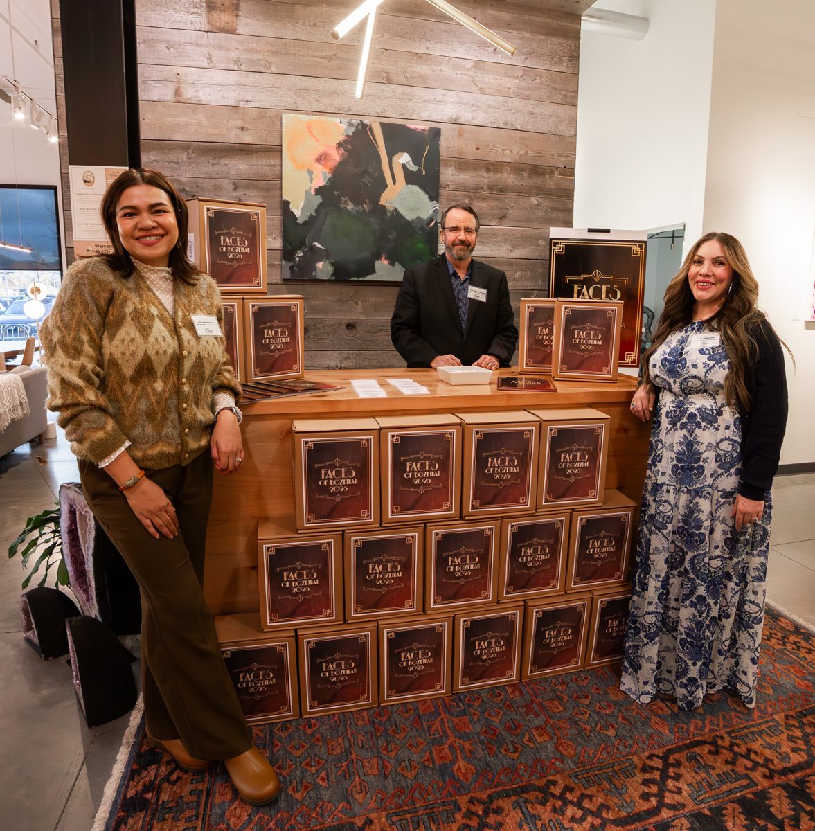 Members with the 2026 books at the 2026 Faces of Bozeman launch party
