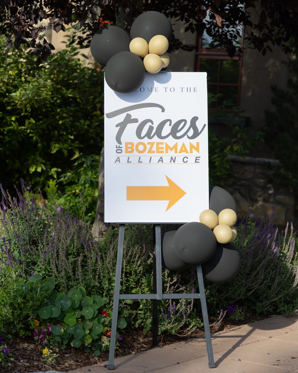 The Faces of Bozeman Alliance sign at the Faces of Bozeman Alliance summer social at the Black Bull