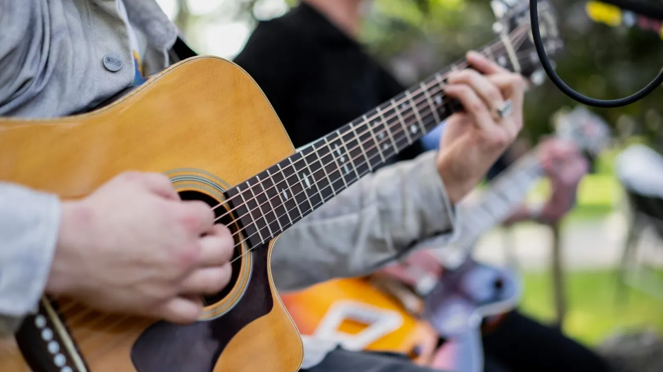 Acoustic guitarist performing live