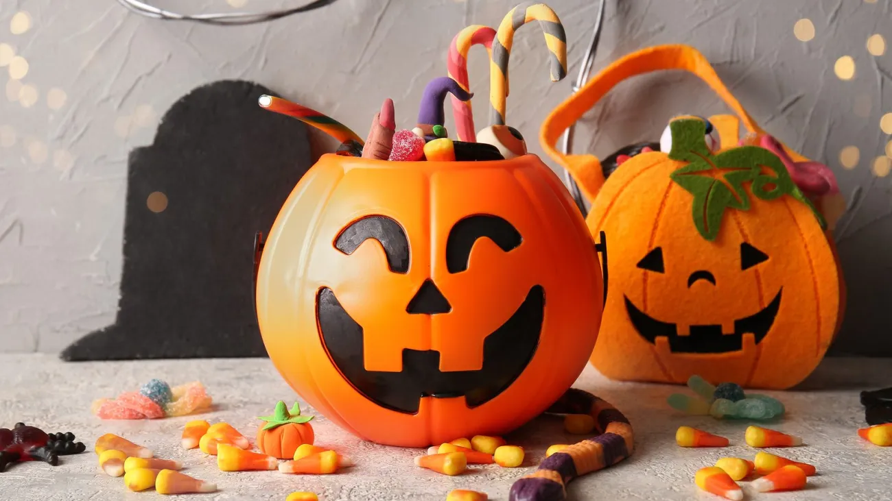 Jack-o-lantern bucket filled with Halloween candy