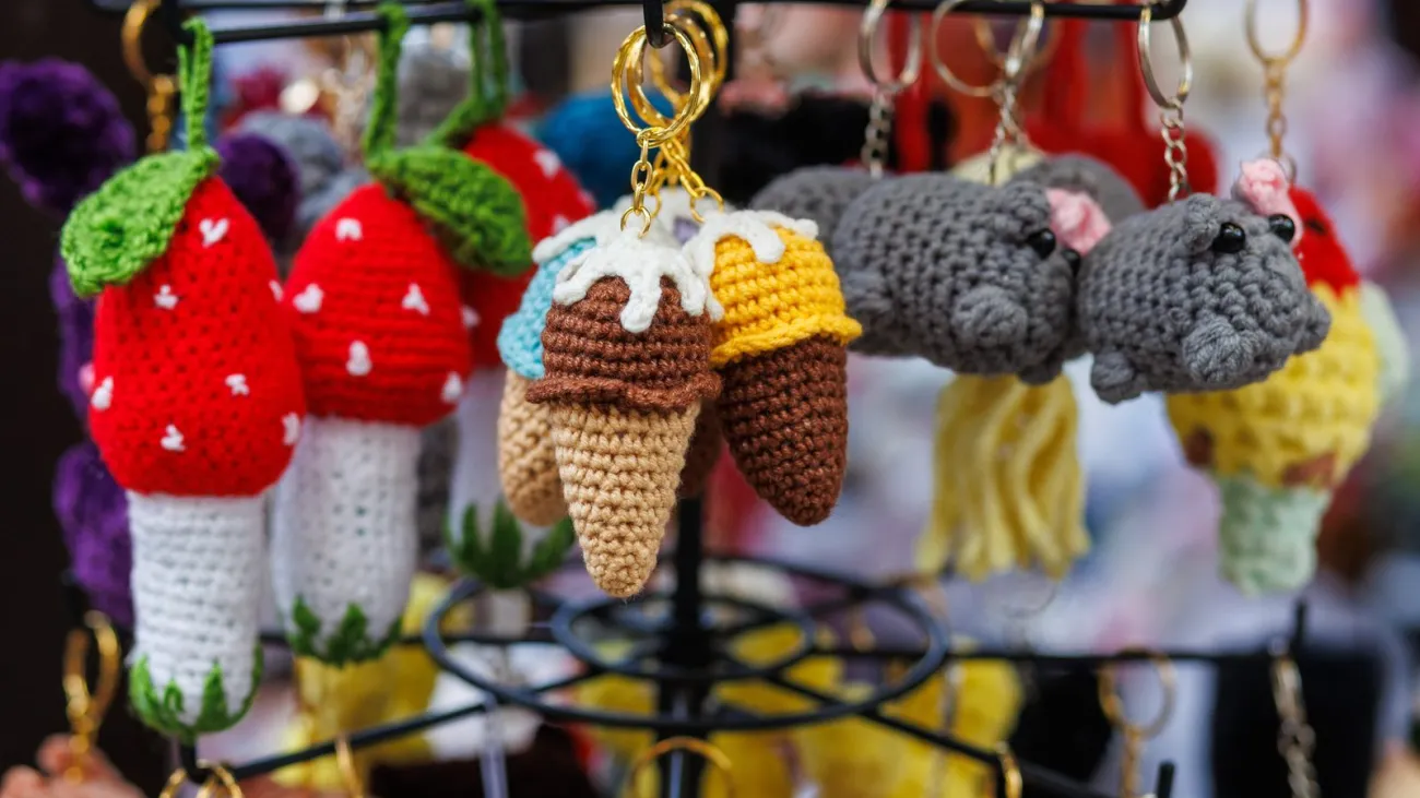 Handmade crochet keychains at a holiday craft stall