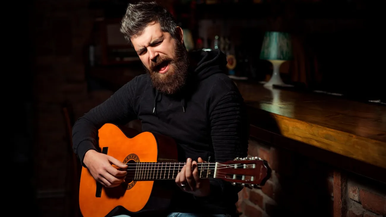 Guitarist performing in a pub