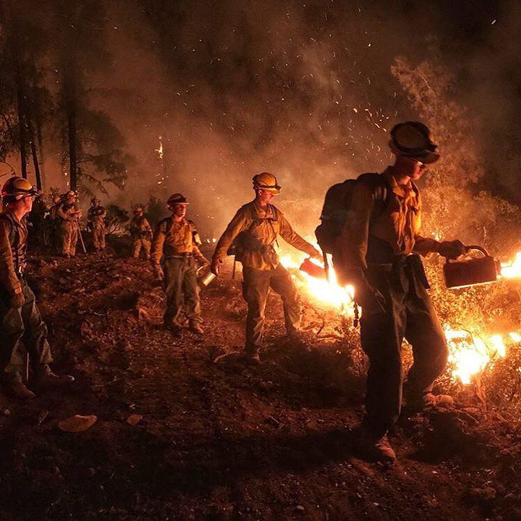Fire fighters at night