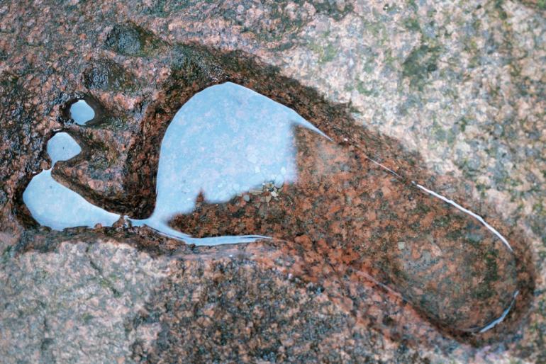 Footprint in granite