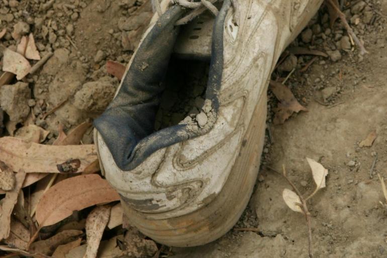 Worn out tennis shoe