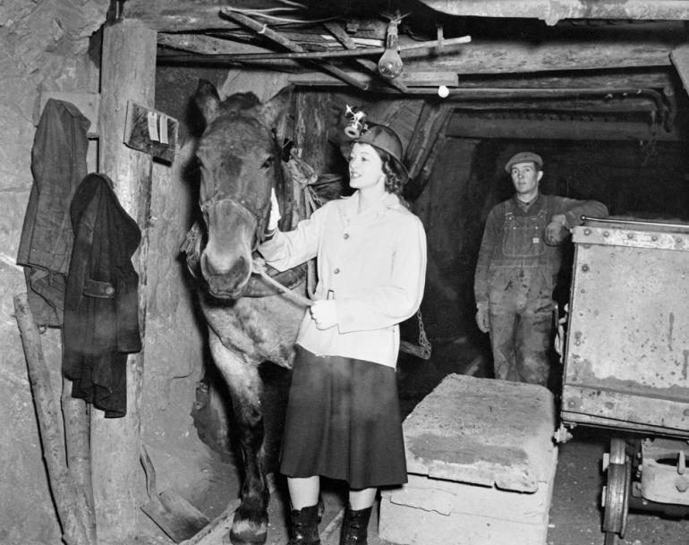 Myrna Loy inspecting the mines