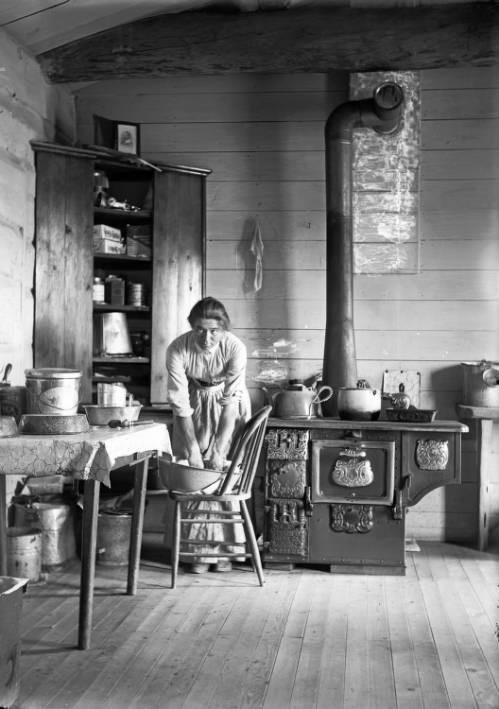 Evelyn Cameron making bread