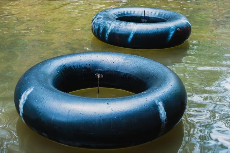 Inner tubes on river