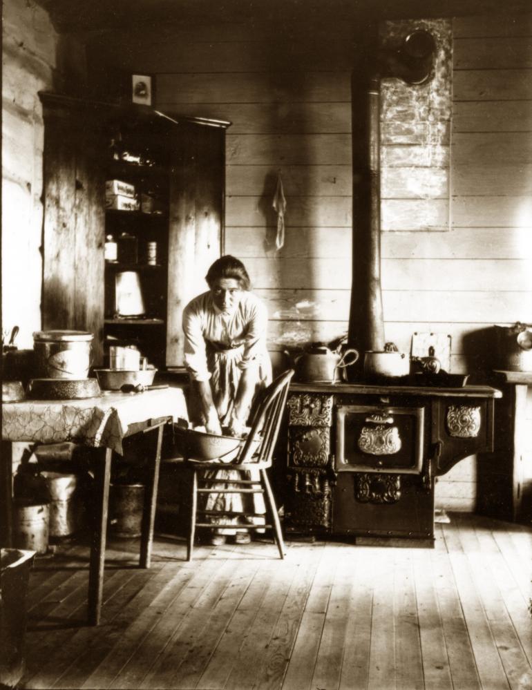 Evelyn Cameron kneading bread