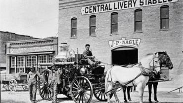 Firemen outside of Missoula livery