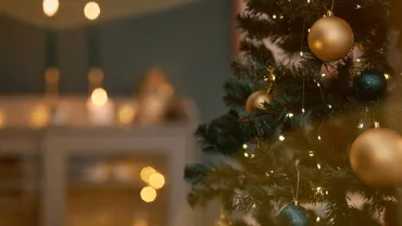 Christmas tree decorated with gold ornaments