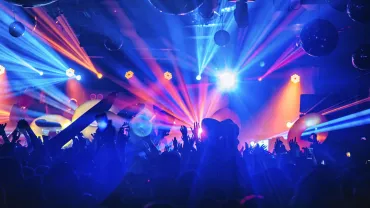Dj night club party rave with crowd in music festive