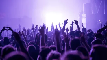 Crowd celebrating at a New Year's Eve party