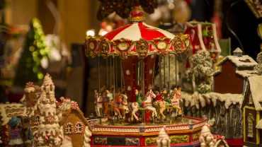 Holiday bazaar stalls with glass, wooden and ceramic ornaments