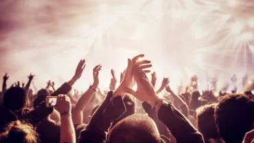Large crowd enjoying a concert