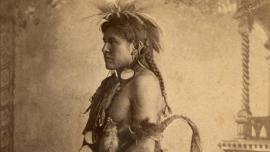 Studio portrait of a young unidentified Crow Indian man circa 1880-1890 (thumbnail)