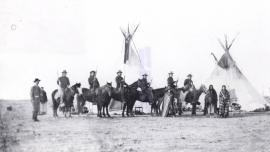 Six Crow Scouts outside Fort Custer