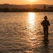 Fishing Into The Sunset | Photo by Carol Polich