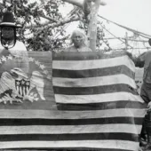 Two Chippewa-Cree Men Posing with 1803 Peace Flag