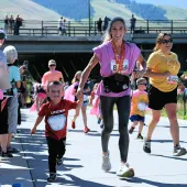 https://www.distinctlymontana.com/sites/default/files/2025-06/kids_run_-_trasie_humble.jpg